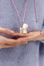 Підвіс Puppy white з рожевим шнурком